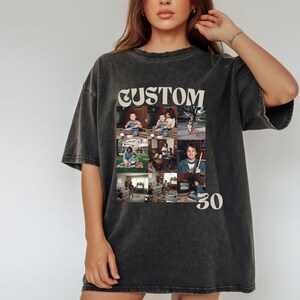 Puede incluir: Camiseta gris oscuro con la palabra "CUSTOM" sobre un collage de nueve fotos. Debajo de las fotos est&aacute; el n&uacute;mero "30". La camiseta tiene un aspecto ligeramente descolorido y desgastado.
