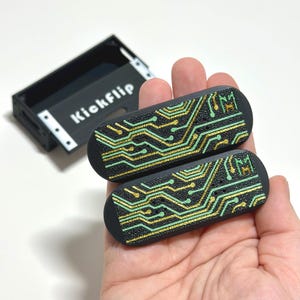 Kickflip Magnetic Skateboard Fidget Toy with Sliding Case Option | Glow in the Dark, Various Colours Circuits Green&Gold