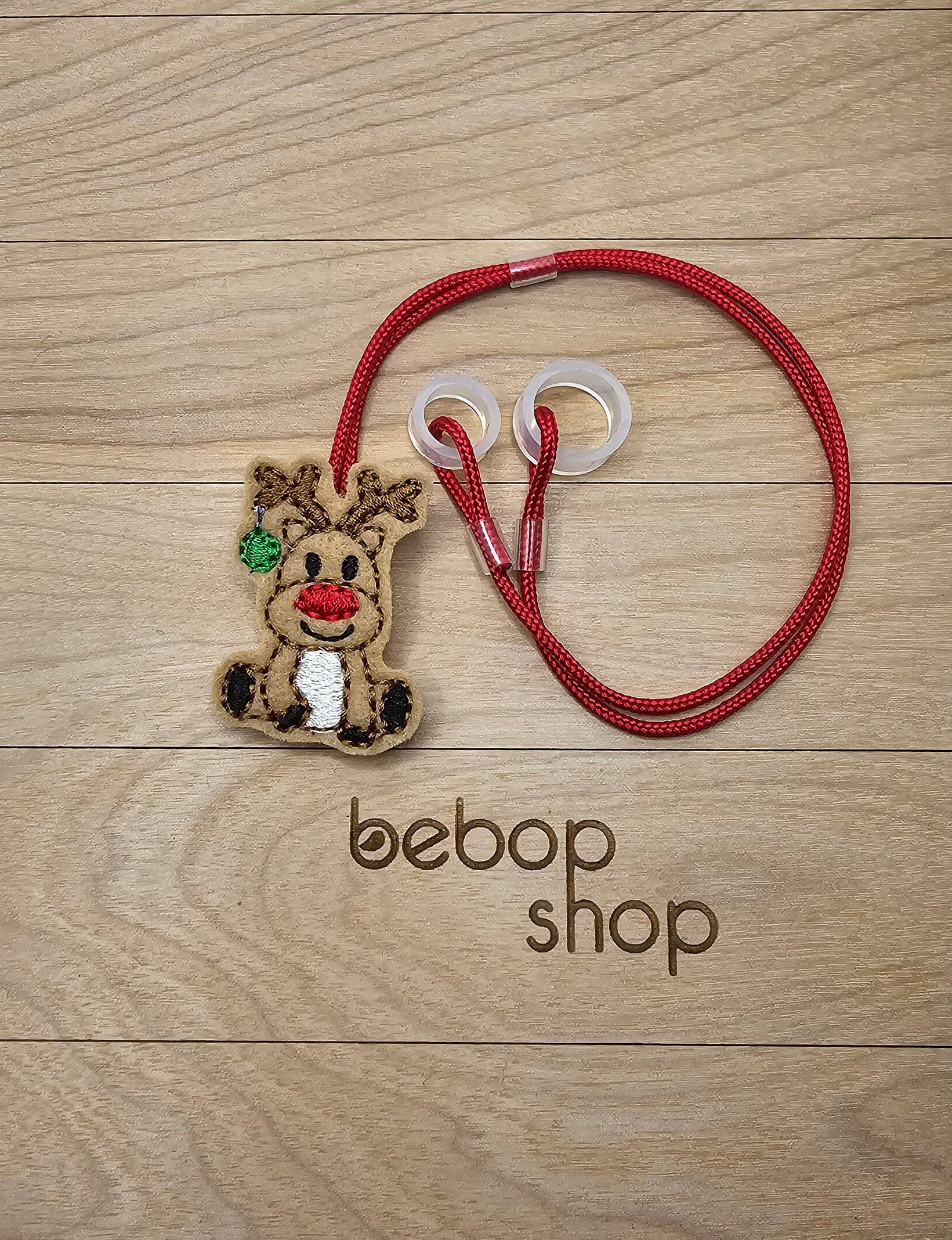 Reindeer with Ornament- Hearing Aid Cord or Cochlear Implant Cord