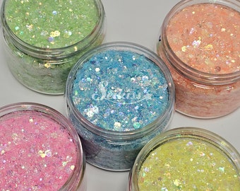 Spring glitter bundle mix for resin, nails, tumblers, jewelry, arts, crafts and all projects. Iridescent Pink, Blue, Green, Yellow & Orange