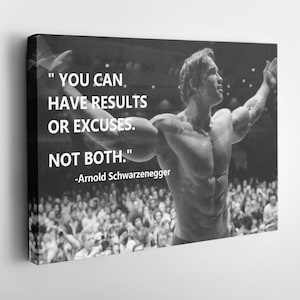 May include: Black and white canvas print featuring Arnold Schwarzenegger with the quote: "YOU CAN HAVE RESULTS OR EXCUSES. NOT BOTH." The image shows Schwarzenegger flexing his muscles in front of a crowd.