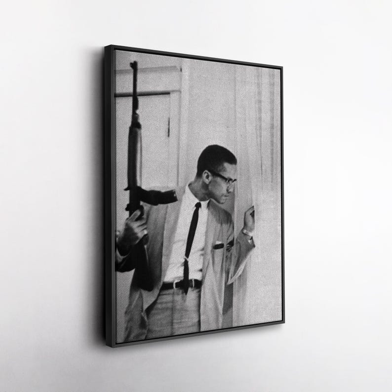 Malcolm X Holding Gun Canvas – Powerful Civil Rights Wall Art, Iconic Historical Photo Print, Revolutionary Decor, Gift for History Buffs