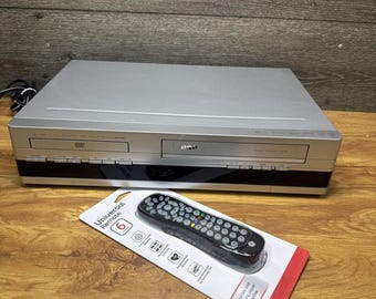 Videoregistratore combinato VHS/DVD RCA DRC6100 con telecomando