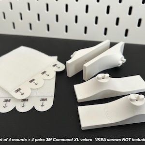 May include: A set of three ceramic mugs with a speckled, matte finish. The mugs are in shades of cream, light gray, and dark gray. Each mug has a simple, minimalist design, perfect for coffee or tea.