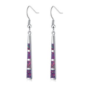 May include: A pair of silver-tone earrings with a linear design. Each earring features a long, rectangular shape with three sections of vibrant purple and pink opal-like material separated by thin silver bands. The earrings have a simple hook closure.