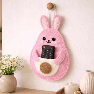 May include: A set of three ceramic mugs with a speckled, matte finish. The mugs are in shades of cream, light grey, and dark grey. Each mug has a simple, minimalist design, ideal for coffee or tea.