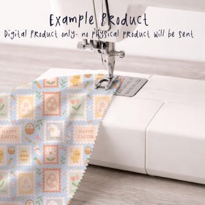 May include: A sewing machine stitching a light blue fabric with an Easter-themed pattern. The fabric features stamps with eggs, chicks, sheep, and the words "Happy Easter" and "Spring". The text "Example Product" and "Digital Product only- no physical product will be sent" are also visible.