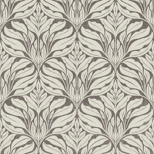 May include: A repeating pattern of stylized leaves in cream and gray. The design features large, symmetrical leaf shapes arranged in a repeating pattern, creating a wallpaper or fabric design. The background has a textured appearance.