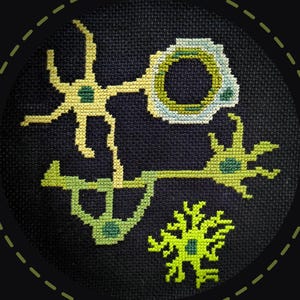 May include: A cross-stitch design on black fabric featuring abstract shapes in shades of yellow, green, and blue. The design includes a circular element and branching structures, all within a circular frame.