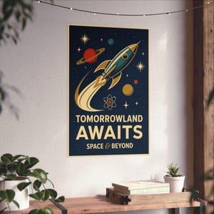 May include: A rectangular wall poster featuring a dark blue background with a stylized rocket ship launching upward, surrounded by planets, stars, and an atom symbol. The text reads TOMORROWLAND AWAITS SPACE & BEYOND in bold cream lettering.