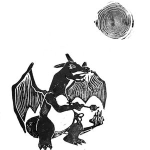 May include: Black and white linocut print of a dragon-like creature roasting something over a fire. The creature has large wings and is facing right. A circular sun or moon is in the upper right corner.