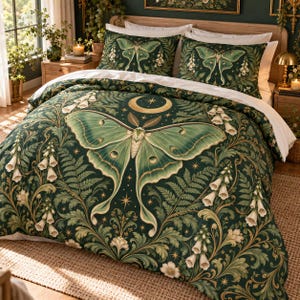 May include: A dark green duvet cover and two matching pillowcases featuring a large central luna moth, a golden crescent moon, and a repeating pattern of white bell-shaped flowers, fern leaves, and small golden stars on a dark background.