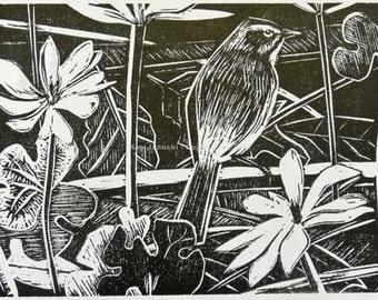 May include: Black and white woodcut print of a bird perched on a branch with leaves and flowers. The bird is facing right and has a long tail. The leaves and flowers are stylized and have a simple design.
