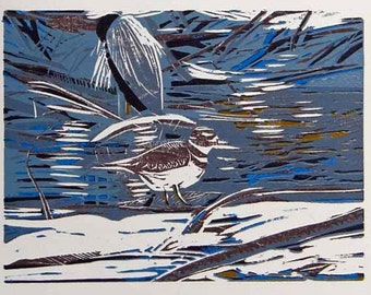 May include: A blue and white abstract print of a bird and a smaller bird in a natural setting. The print is done in a woodblock style.