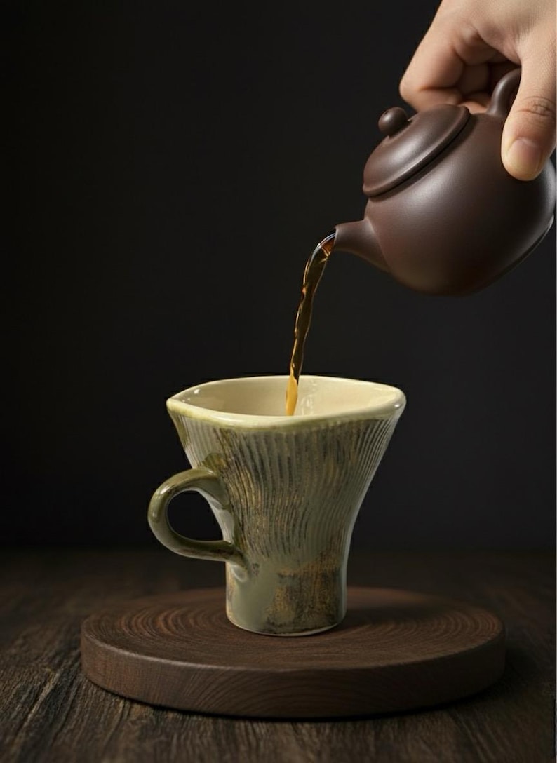 designer ceramic mugs, handmade pottery cups, artistic ceramic coffee mug, unique ceramic drinkware, sculptural pottery mug, rustic ceramic cup, handcrafted mug with handle, collectible pottery cup, gift for family, christmas gift, holiday gift idea, artisan ceramic mug, cozy coffee cup, modern pottery design, handmade kitchenware, ceramic cup for coffee and tea, gift ideas for home, festive home gift, pottery art cup, natural clay mug, earthy ceramic drinkware, mug for coffee lovers