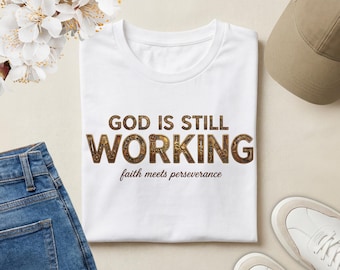 God Is Still Working Christian T-Shirt | Faith Encouragement Tee | Inspirational Jesus Shirt | Perseverance Gospel Apparel | Christian Gift