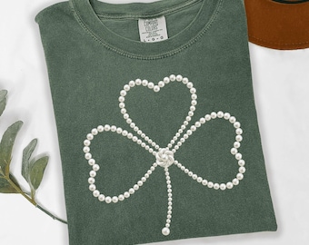 Elegante camiseta con trébol de la suerte y perla para el Día de San Patricio