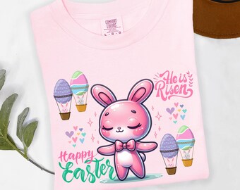 Camiseta gráfica de Pascua con lazo de conejito rosa "He Is Risen" para niños, regalo familiar a juego