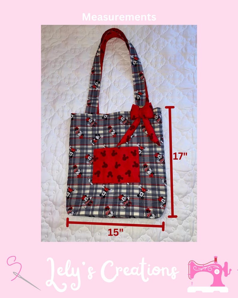 May include: A handmade tote bag with a gray plaid pattern featuring Mickey Mouse. The bag has red accents, including a bow and a pocket with a Mickey Mouse pattern. It measures 15 inches wide and 17 inches tall.