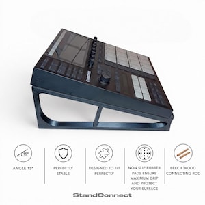 May include: A black angled stand supporting a Maschine music production controller. The stand features a 15-degree incline, non-slip rubber pads, and a beech wood connecting rod. Text below highlights features including a 15-degree angle and StandConnect branding.