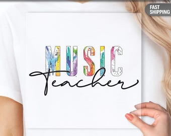Camiseta para profesor de música con diseño estampado DTF – Letras musicales coloridas, ideal como regalo para instructor de banda o coro.