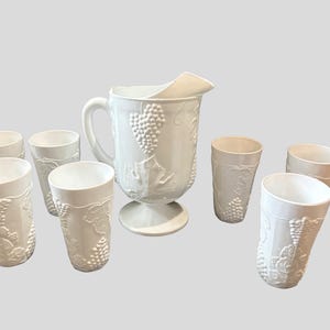 Vintage milk, glass, pitcher, and tumblers