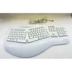 May include: A white ergonomic keyboard with a curved design, featuring a split key layout and a numeric keypad. The keyboard has a USB cable and is designed for comfortable typing. The keys are white with black lettering.