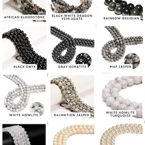 May include: A collection of twelve strands of round gemstone beads including African Bloodstone, Black White Dragon Vein Agate, Rainbow Obsidian, Black Onyx, Gray Hematite, Map Jasper, White Howlite, Dalmation Jasper, White Howlite Turquoise, Natural White Jade, Natural Ivory Jasper, and White Shell Pearl.