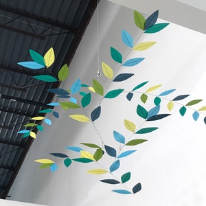 Suspended Mobile, Bejeweled baby mobile of tree leaves in green, blue, and yellow
