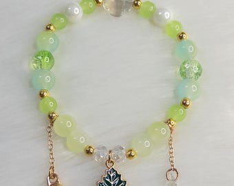 Forestcore Beaded Bracelet: Enamel Leaf, Acorn & Crystal Cross