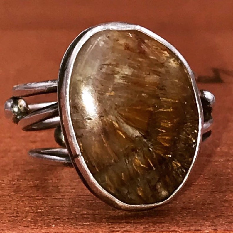 Sterling silver ring with Cacoxinite