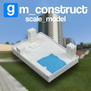 May include: A white scale model of a building complex with two rectangular towers and a blue textured area, possibly representing a pool. The model is labelled "gm_construct scale_model" in blue and white text.