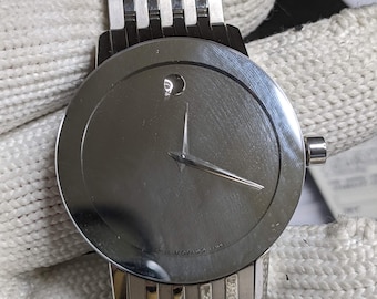 Reloj Movado Concept 60 Museum: Diseño minimalista suizo en acero.