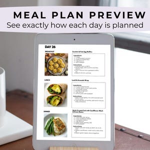 May include: A digital tablet displays a meal plan preview with the text "Meal Plan Preview" and "See exactly how each day is planned." The screen shows a daily meal plan with breakfast, lunch, and dinner options, including recipes for Zucchini & Feta Egg Muffins.