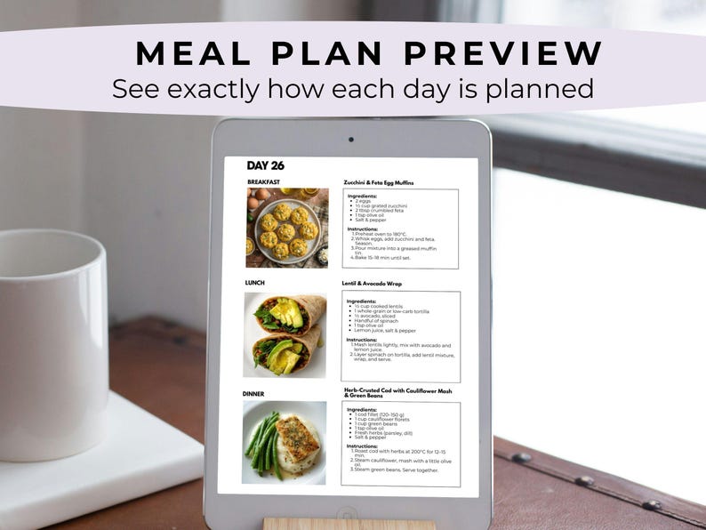 May include: A digital tablet displays a meal plan preview with the text "Meal Plan Preview" and "See exactly how each day is planned." The screen shows a daily meal plan with breakfast, lunch, and dinner options, including recipes for Zucchini & Feta Egg Muffins.