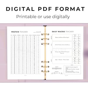 May include: A light purple binder with a white and black printable planner insert. The planner includes a protein tracker and a daily macro tracker. The text "DIGITAL PDF FORMAT" and "Printable or use digitally" are at the top.
