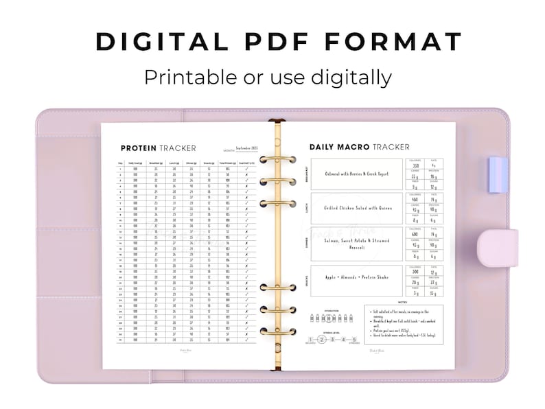 May include: A light purple binder with a white and black printable planner insert. The planner includes a protein tracker and a daily macro tracker. The text "DIGITAL PDF FORMAT" and "Printable or use digitally" are at the top.