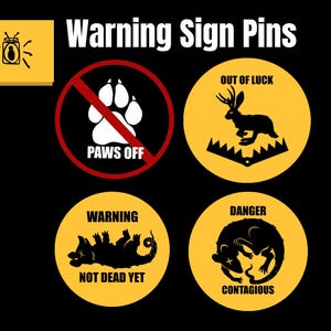 May include: Four circular enamel pins with yellow backgrounds and black graphics. One features a paw print with a red slash and text PAWS OFF. Another shows a jackalope in a trap with text OUT OF LUCK. Others show a possum with WARNING NOT DEAD YET and DANGER CONTAGIOUS.