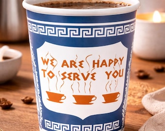 May include: A blue and white coffee cup with a Greek key design and the text "WE ARE HAPPY TO SERVE YOU." The cup contains hot coffee, with steam rising. Three orange coffee cups are below the text.