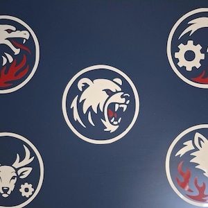 May include: Five white circular emblems with animal and gear designs on a navy blue background. The emblems feature a dragon, eagle, bear, deer, and wolf, each with red flames and a gear. The bear emblem is centered.