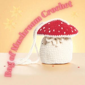 May include: A crocheted mushroom-shaped bag with a red cap dotted with white spots and a white stem. The bag has a drawstring closure and a long white strap. Text on the image reads "Bag of Mushroom Crochet".