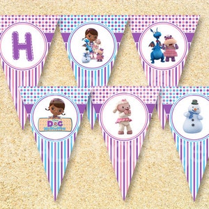 May include: A purple, pink, and blue triangular banner with a polka dot pattern and stripes. The banner features characters from the children's show Doc McStuffins, including Doc McStuffins, Lambie, and a snowman. The banner also includes the letter H.