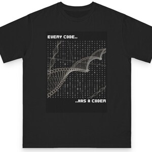 May include: A black short-sleeved t-shirt featuring a central graphic of a white DNA double helix structure overlaid on a background of binary code. The text "EVERY CODE.." appears above the graphic, and "..HAS A CODER" is printed below it.