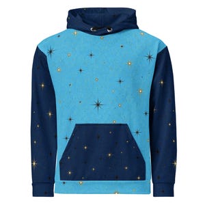 May include: A long-sleeve hooded sweatshirt featuring a light blue center panel and dark navy blue sleeves, hood, and front kangaroo pocket. The entire garment is covered in a repeating pattern of small, four-pointed black and gold star icons.