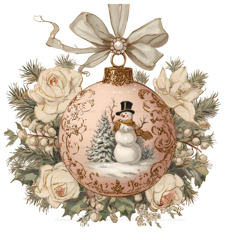 May include: A pale pink Christmas ornament featuring a snowman in a top hat and a pine tree, surrounded by white roses, green pine needles, and white berries. The ornament is topped with a gold cap and a large, light-colored fabric bow.