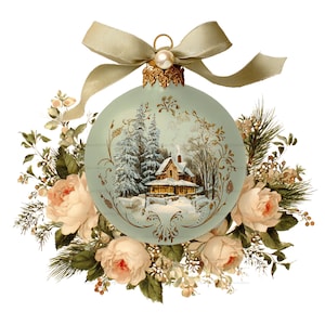 May include: A pale green Christmas ornament featuring a winter landscape with a cabin and pine trees, framed by gold filigree. The ornament is topped with a beige ribbon and a pearl, and surrounded by a wreath of pale pink roses and pine needles.