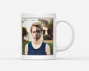 Taza de café Fall Out Boy - Belleza americana / Psicosis americana