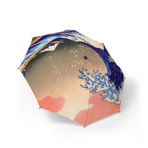 Künstlerischer Wellen-Design-Regenschirm - stilvolle, tragbare Regenkleidung, Geschenk für Naturliebhaber, ideal für Regentage, perfekt für Reisen