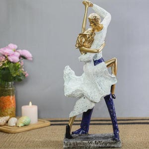 Stunning Dancer Statue with Gold Accents – Perfect for Living Room Decor