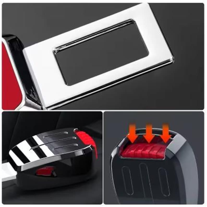 May include: Close-up of a car seat belt buckle and release mechanism. The buckle is chrome-plated with a rectangular opening. The release button is red. The mechanism is black.